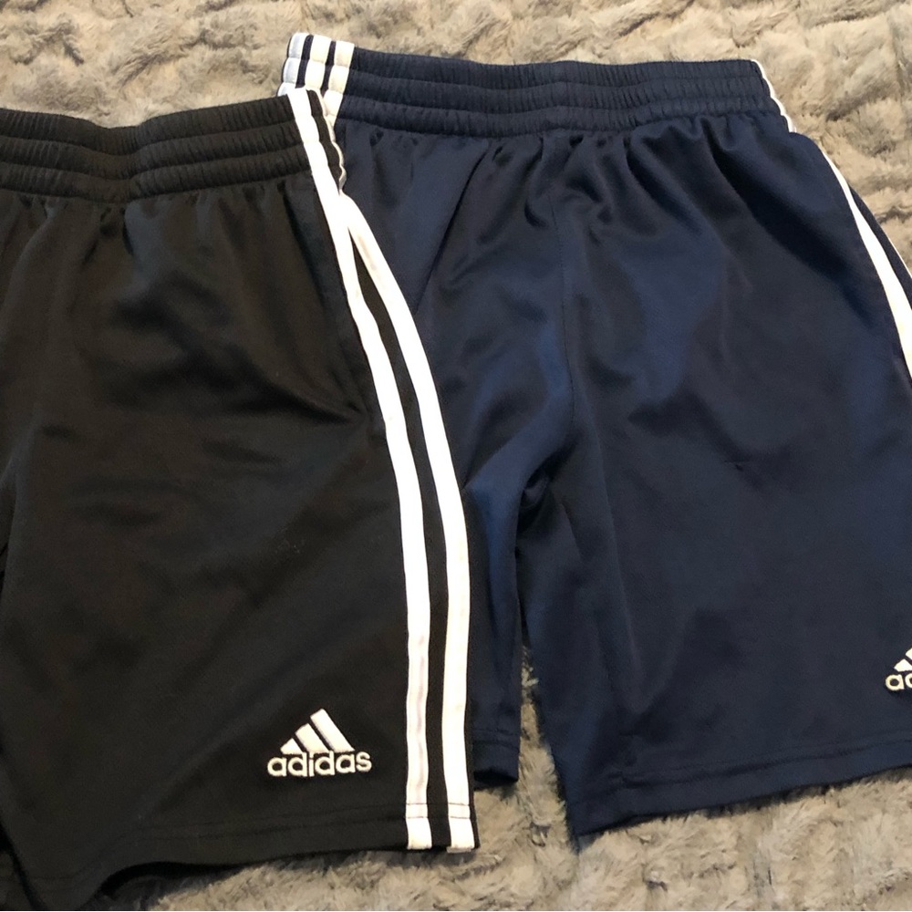 Two pairs of adidas shorts